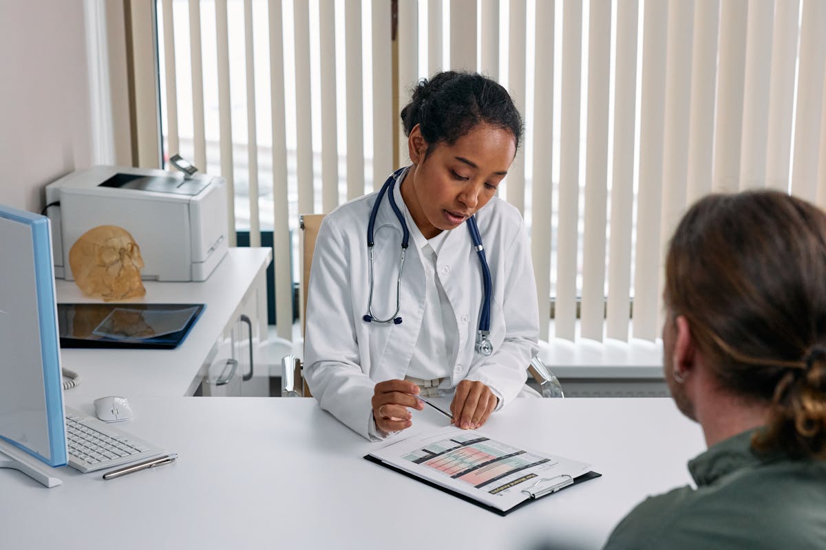 doctor talking to patient